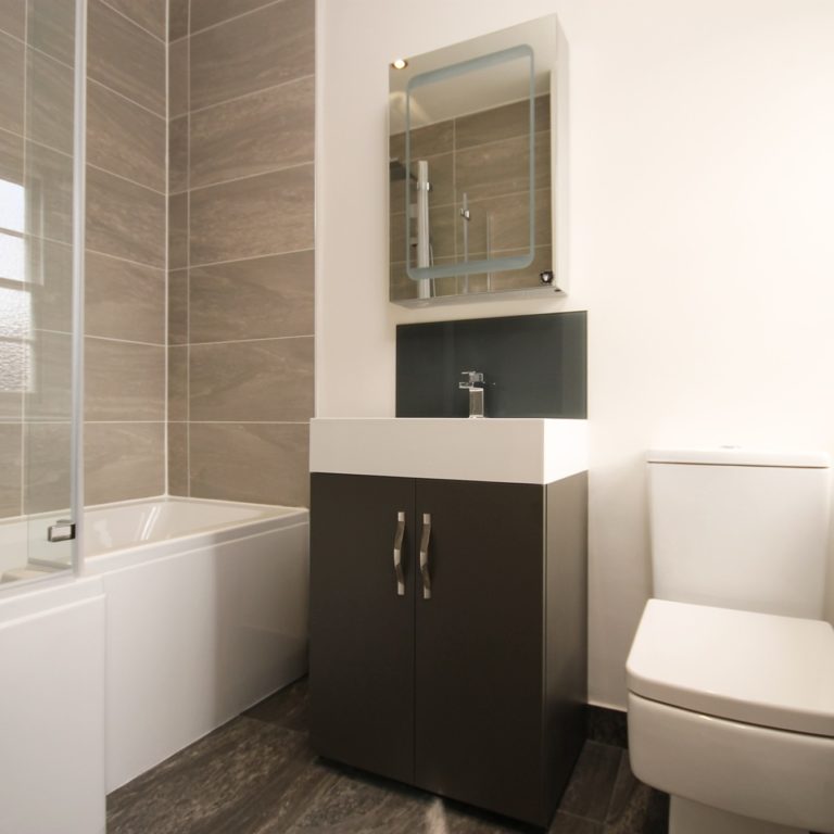 waterdamagebehindshowertiles Water damage behind shower